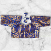 blue colour katan banarasi padded sabyaachi cut blouse with latkan