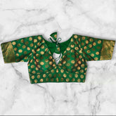 green colour golden booti v cut banarasi blouse