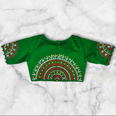 it is a multi colour thread work boat neck blouse