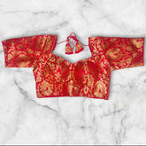 red color with golden zari katan benarasi