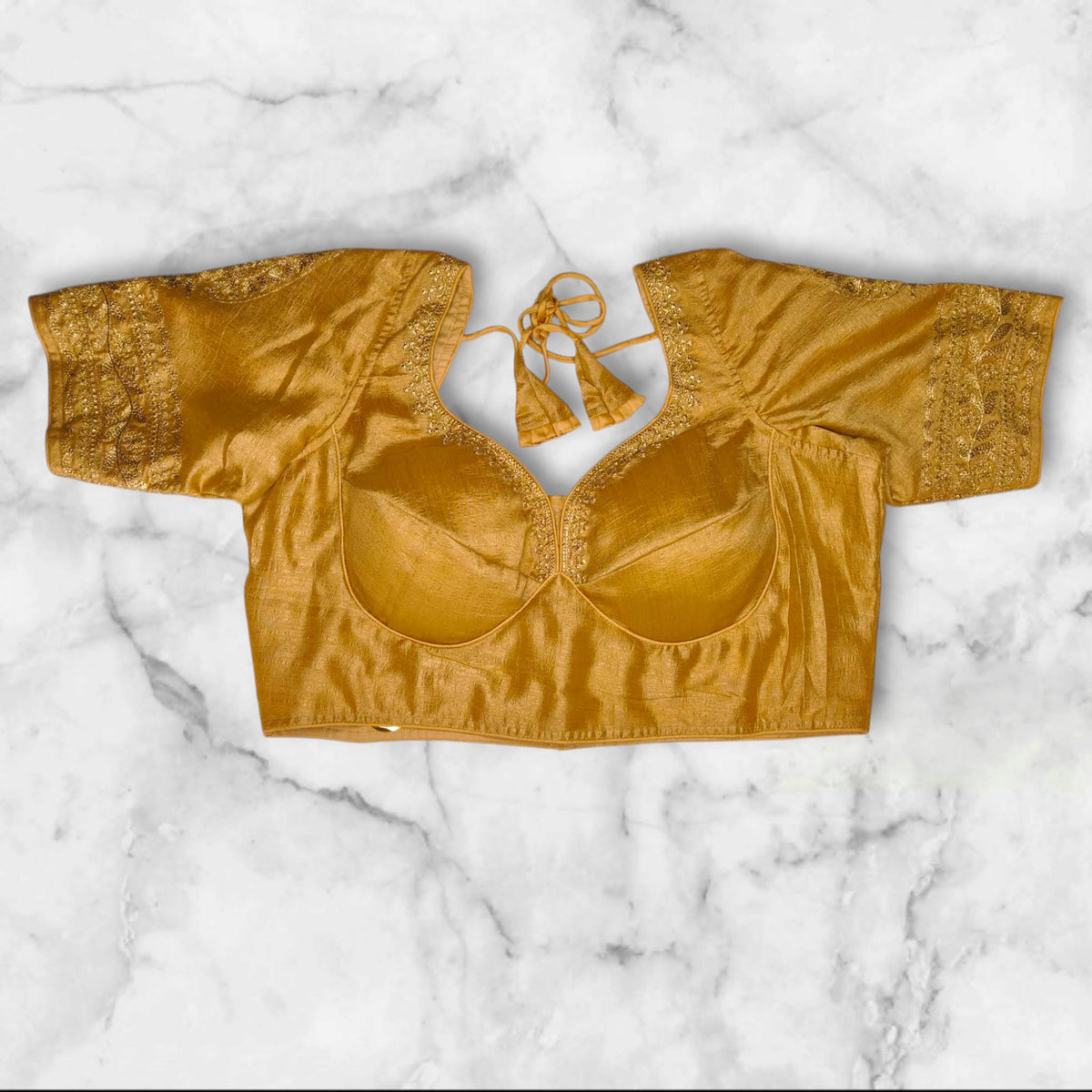 golden colour semi silk blouse with embroidery work