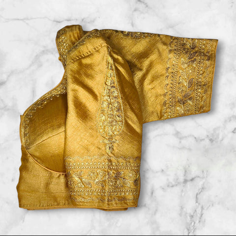 golden colour embroidery blouse hand design