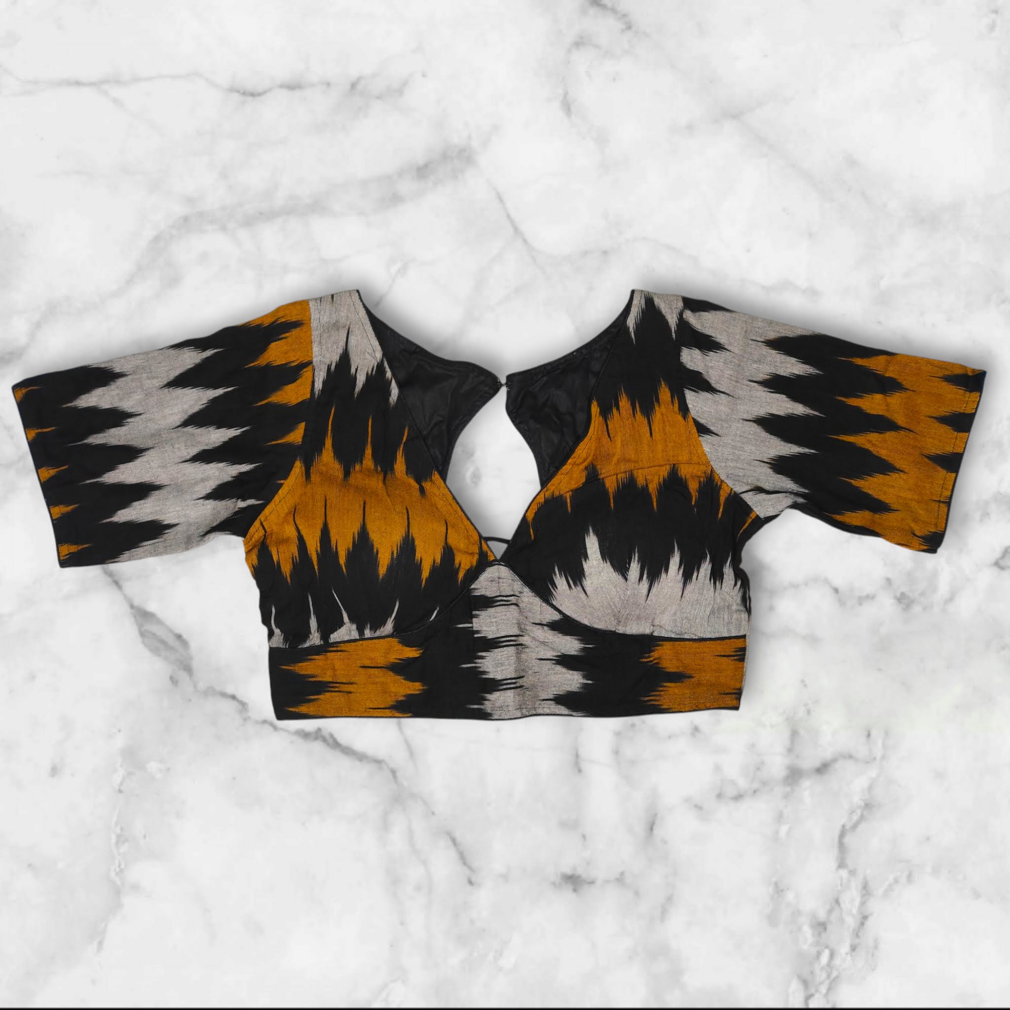 it is a ikkat cotton blouse readymade
