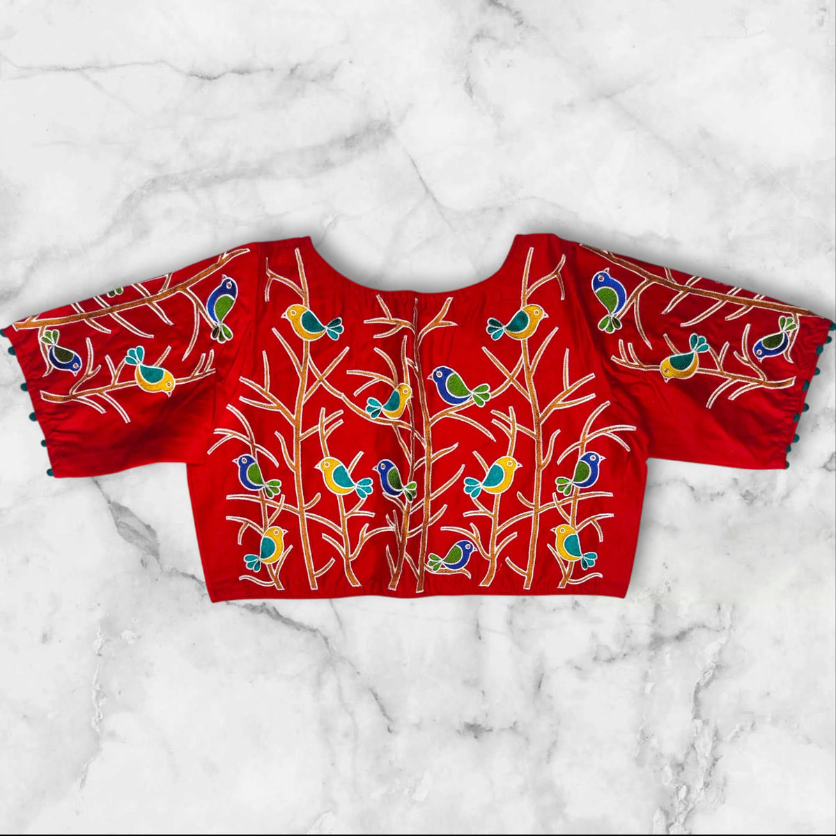 red boat neck bird motif blouse back and sleeves design